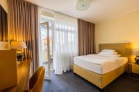 Postel nebo postele na pokoji v ubytování Mamma´s Boutique Hotel