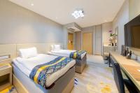 Livington Hotelにあるテレビまたはエンターテインメントセンター