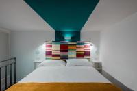 A bed or beds in a room at Casa Trastè