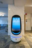 Livington Hotelにあるテレビまたはエンターテインメントセンター