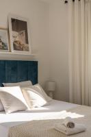Posteľ alebo postele v izbe v ubytovaní Apartment with terrace and parking near beach