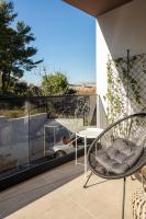 Balkón alebo terasa v ubytovaní Apartment with terrace and parking near beach