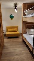 Posteľ alebo postele v izbe v ubytovaní Chalet Les Cochettes