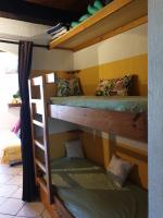 a bunk bed with two bunk beds in a room at Studio Mezzanine vue port et mer in La Londe-les-Maures