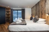 Posteľ alebo postele v izbe v ubytovaní Chalet Alpaga One