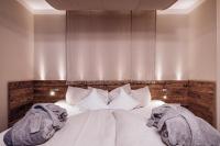 Postel nebo postele na pokoji v ubytování Familienresort Ellmauhof - das echte All Inclusive