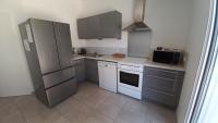 Kuchnia lub aneks kuchenny w obiekcie LES SILENES - Maison 3 chambres proche plage