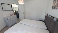 Łóżko lub łóżka w pokoju w obiekcie LES SILENES - Maison 3 chambres proche plage