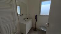 Łazienka w obiekcie LES SILENES - Maison 3 chambres proche plage