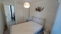 Łóżko lub łóżka w pokoju w obiekcie LES SILENES - Maison 3 chambres proche plage