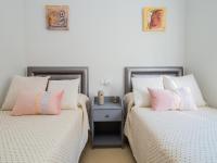 Posteľ alebo postele v izbe v ubytovaní Cubo's Liberty Apartment