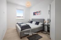 Postel nebo postele na pokoji v ubytování Penthouse Seaview Emilia
