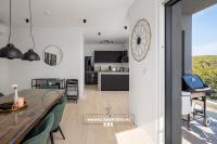 Kuchyň nebo kuchyňský kout v ubytování Penthouse Seaview Emilia