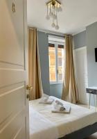 A bed or beds in a room at San Pietro Rooms 84
