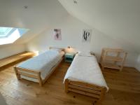 Posteľ alebo postele v izbe v ubytovaní Maisonnette confortable à Pornic