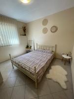Postel nebo postele na pokoji v ubytování Apartmani Štrk II