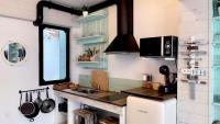 Kuchyň nebo kuchyňský kout v ubytování New Cozy Beach apartment, WiFi