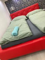 Posteľ alebo postele v izbe v ubytovaní Roland Apartment Downtown - Akácfa