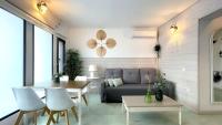 Posezení v ubytování New Cozy Beach apartment, WiFi