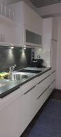 Kuchnia lub aneks kuchenny w obiekcie Belladonna Panorama Apartment