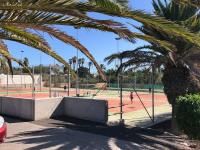Tenis a/nebo squash v ubytování Primavera holiday apartment nebo okolí