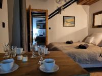 Posteľ alebo postele v izbe v ubytovaní Apartamenty Stylo