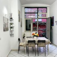 Televízia a/alebo spoločenská miestnosť v ubytovaní Aurora's Home