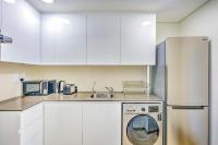 Expo Village Serviced Apartmentsにあるキッチンまたは簡易キッチン