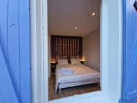 Tempat tidur dalam kamar di Le Cosy
