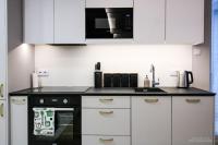 Kuchnia lub aneks kuchenny w obiekcie D Apartments Centrum Powietrze