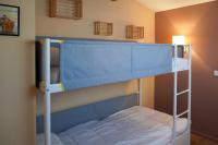 Łóżko lub łóżka w pokoju w obiekcie Villa 2 étoiles proche plage et commerces