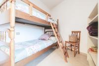 A bed or beds in a room at Casa Giovanetti