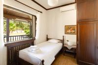 Posteľ alebo postele v izbe v ubytovaní Malt Beachfront Villa