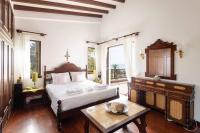 Posteľ alebo postele v izbe v ubytovaní Malt Beachfront Villa