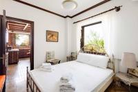 Posteľ alebo postele v izbe v ubytovaní Malt Beachfront Villa