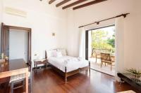 Posteľ alebo postele v izbe v ubytovaní Malt Beachfront Villa