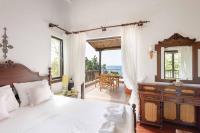Posteľ alebo postele v izbe v ubytovaní Malt Beachfront Villa