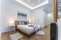 Łóżko lub łóżka w pokoju w obiekcie Premium Apartment La Latina
