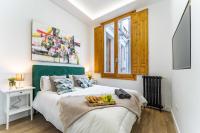Łóżko lub łóżka w pokoju w obiekcie Premium Apartment La Latina