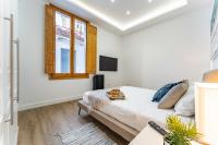 Łóżko lub łóżka w pokoju w obiekcie Premium Apartment La Latina