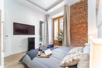 Telewizja i/lub zestaw kina domowego w obiekcie Premium Apartment La Latina