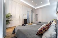 Łóżko lub łóżka w pokoju w obiekcie Premium Apartment La Latina