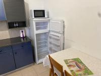 Kuchyň nebo kuchyňský kout v ubytování Nefeli Β1 apartment