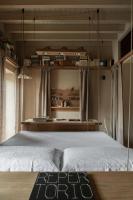 Posteľ alebo postele v izbe v ubytovaní Boutique suite sul Naviglio Grande