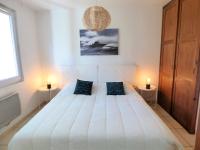 Łóżko lub łóżka w pokoju w obiekcie *VILLA PALMA* 5 suites parentales, plage à 600 m, Vieux-Boucau