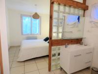 Łóżko lub łóżka w pokoju w obiekcie *VILLA PALMA* 5 suites parentales, plage à 600 m, Vieux-Boucau