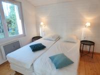 Łóżko lub łóżka w pokoju w obiekcie *VILLA PALMA* 5 suites parentales, plage à 600 m, Vieux-Boucau