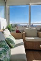 Posezení v ubytování Ático Los Flamingos. Exclusive terrace with views