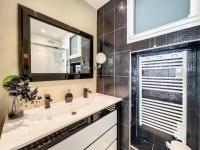a bathroom with a sink and a shower at Appartement Cannes, 2 pièces, 2 personnes - FR-1-470-27 in Cannes