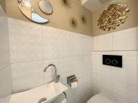 a bathroom with a sink and a toilet and a mirror at Appartement Cannes, 2 pièces, 2 personnes - FR-1-470-27 in Cannes